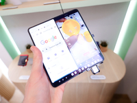 The OnePlus Open, a vertically folding smartphone designed by the Chinese company and subsidiary of Oppo, is displaying TikTok videos on And...