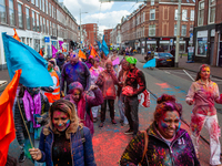 People are celebrating in the multicultural Transvaal neighborhood of The Hague, Netherlands, on March 25, 2024, where the largest Indian po...