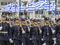 Armed forces are participating in the military parade in central Athens. (