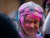 People celebrate Holi, the Hindu holiday marking love and spring, in Washington, DC, March 25, 2024.   The holiday, often known as the Festi...