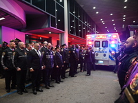 The body of NYPD Officer Jonathan Diller is being brought out of Jamaica Hospital and placed in an ambulance for the dignified transfer. Off...