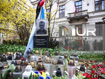 Flowers and candles are seen in a tribute to Alexei Navalny in front of the Russian Consulate General in Krakow, Poland on March 25th, 2024....