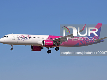 An Airbus A321-271NX from Wizz Air, featuring the Abu Dhabi livery, is landing at Barcelona Airport in Barcelona, Spain, on February 29, 202...