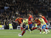 16q is scoring a goal during the friendly match between Spain and Brazil at Santiago Bernabeu Stadium in Madrid, Spain, on March 26. (