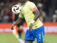 Vinicius Junior of Brazil is controlling the ball during the friendly match between Spain and Brazil at Santiago Bernabeu Stadium in Madrid,...