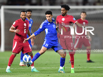 Eid Al Rashedi (C) of Kuwait is in action against Yusuf Abdurisag (R) of Qatar during the FIFA World Cup 2026 and the AFC Asian Cup Saudi Ar...