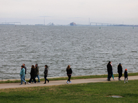 People view the collapsed Francis Scott Key Bridge in Baltimore, Maryland from the Fort McHenry National Monument and Historic Shrine on Mar...
