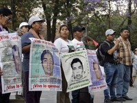 Relatives of the Ayotzinapa victims are taking part in a demonstration to demand justice for the disappearance of the 43 students from the r...