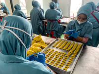 Employees are making cookies at the J&C Cookies factory in Bandung, Indonesia, on March 27, 2024. The cookie manufacturer, J&C Cookies, is p...