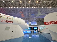 A prototype of the C919 passenger jet is being displayed at the COMAC Shanghai Aircraft Design and Research Institute in Shanghai, China, on...