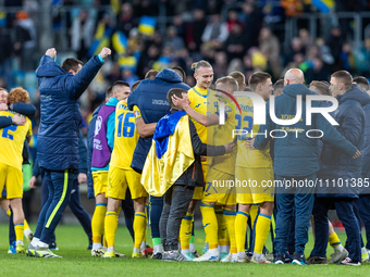 The Ukraine team is celebrating after the UEFA EURO 2024 Play-Offs final match between Ukraine and Iceland in Wroclaw, Poland, on March 26,...