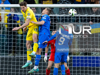 Illia Zabarnyi and Jon Dagur Thorsteinsson are playing in the UEFA EURO 2024 Play-Offs final match between Ukraine and Iceland in Wroclaw, P...