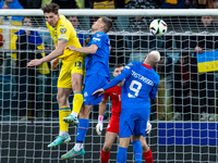 Illia Zabarnyi and Jon Dagur Thorsteinsson are playing in the UEFA EURO 2024 Play-Offs final match between Ukraine and Iceland in Wroclaw, P...