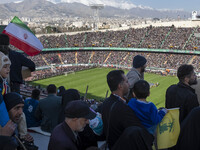 Iranian men are arriving at the Azadi (freedom) Stadium to participate in a religious gathering commemorating the holy month of Ramadan in w...