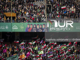 Iranian worshippers and supporters of Iran's Supreme Leader Ayatollah Ali Khamenei are waving Iranian and Palestinian flags while participat...