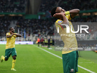 South African players are celebrating after scoring during the international friendly football match between Algeria and South Africa in Alg...