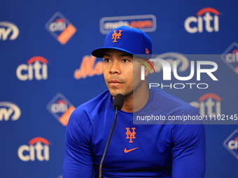 Jose Quintana, the starting pitcher for the New York Mets, #62, is speaking to the media at a press conference at Citi Field in Corona, New...