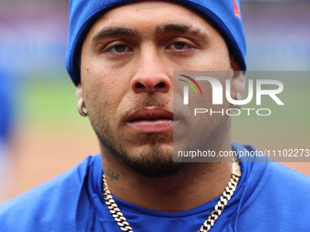 Francisco Alvarez #4 of the New York Mets is being interviewed during batting practice at Citi Field in Corona, New York, on March 27, 2024....