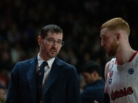 Coach Tom Bialaszewski of Itelyum Varese and Niccolo Mannion, number 04 of Itelyum Varese, are participating in the FIBA Europe Cup match be...