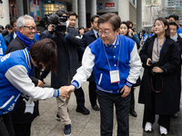 Lee Jae-myung, the leader of the Democratic Party of Korea and the standing co-chairman of the election campaign committee, is making his en...