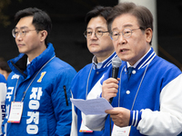 Lee Jae-myung, the leader of the Democratic Party of Korea and the standing co-chairman of the election campaign committee, along with candi...