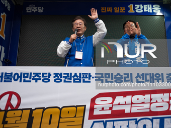 Lee Jae-myung, the leader of the Democratic Party of Korea and the standing co-chairman of the election campaign committee, is delivering a...