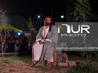 A person representing Jesus Christ is participating in the 58th reenactment of the apprehension of Christ in Santa Anna Chiautempan, Mexico,...
