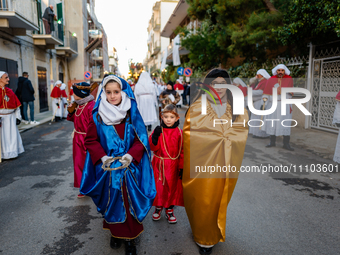 Figurants are participating in the procession of the Eight Saints in Ruvo di Puglia, Italy, on Holy Thursday, March 28, 2024. The procession...