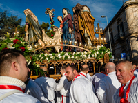 Statue bearers are carrying the figures during the procession of the Eight Saints in Ruvo di Puglia, Italy, on Holy Thursday, March 28, 2024...