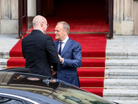 Prime Minister of Poland, Donald Tusk (R) greets Prime Minister of Ukraine, Denys Shmyhal (L) as Ukrainian delegation visits Poland for bila...