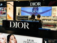 Dior logo is seen in a store at Fiumicino Airport in Rome on March 28, 2024. (