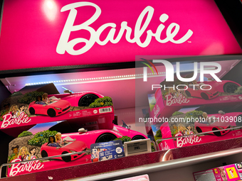 Barbie logo is seen in a store at Fiumicino Airport in Rome on March 28, 2024. (