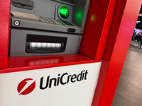 UniCredit logo is seen on ATM machine at Fiumicino Airport in Rome on March 28, 2024. (