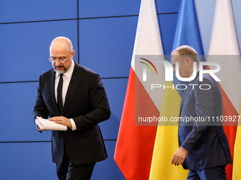 Prime Minister of Poland, Donald Tusk (R) and Prime Minister of Ukraine, Denys Shmyhal (L) arrive for a press conference during bilateral ta...