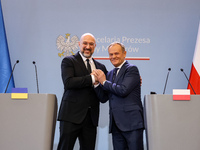 Prime Minister of Poland, Donald Tusk (R) and Prime Minister of Ukraine, Denys Shmyhal shake hands during a press conference during bilatera...