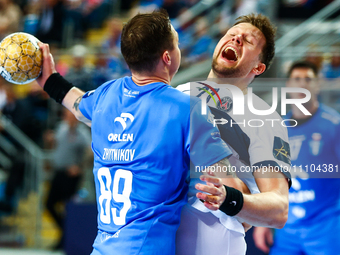 Dmitry Zhitnikov and Kamil Syprzak are playing in the EHF Champions League Men 2023/2024 match between Orlen Wisla Plock and Paris Saint-Ger...