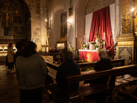 People visiting Sepulchers in the night are seen in Gubbio, Italy, on March 28th, 2024. Holy Thursday, preceding Good Friday, commemorates J...