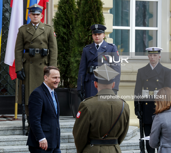 Poland's Foreign Minister Radoslaw Sikorski is arriving for the welcome ceremony for Ukraine's Prime Minister, Denys Shmyhal, ahead of bilat...