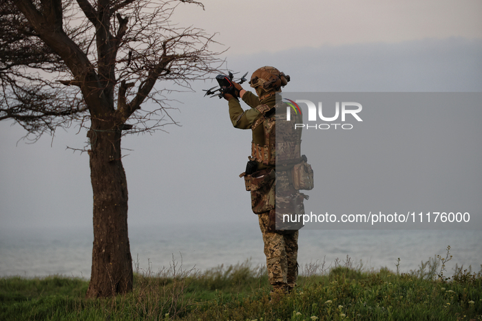 A soldier from a mobile air defense unit of the Armed Forces of Ukraine is working in the Odesa region, southern Ukraine, on April 24, 2024....