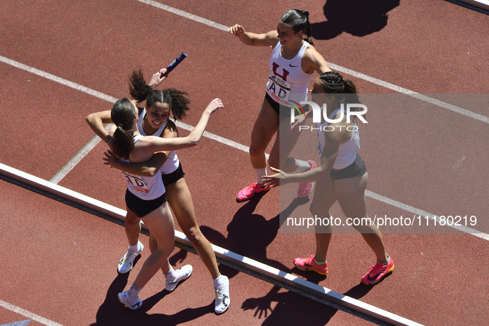 Sophia Gorriaran, Chloe Fair, Victoria Bossong, and Maia Ramsden from Harvard are celebrating after winning the College Women's Distance Med...