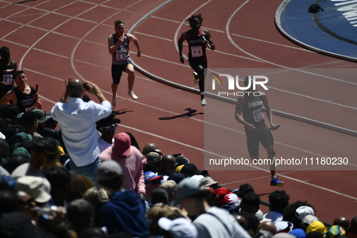 Spectators are watching athletes compete on day 2 of the 128th Penn Relays Carnival, the largest track and field meet in the USA, at Frankli...