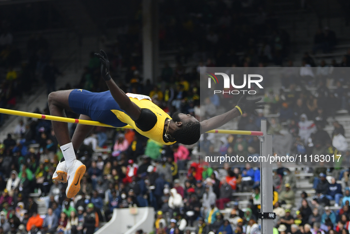 Raymond Richards from UTech is competing in the College Men's High Jump Championship on day 3 of the 128th Penn Relays Carnival, the largest...