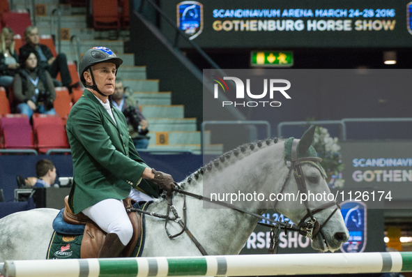 Australia's veteran horse jumper Chris Chugg competes in the opening 1.4 m race against time during the 2016 Gothenburg Horse Show  in Gothe...