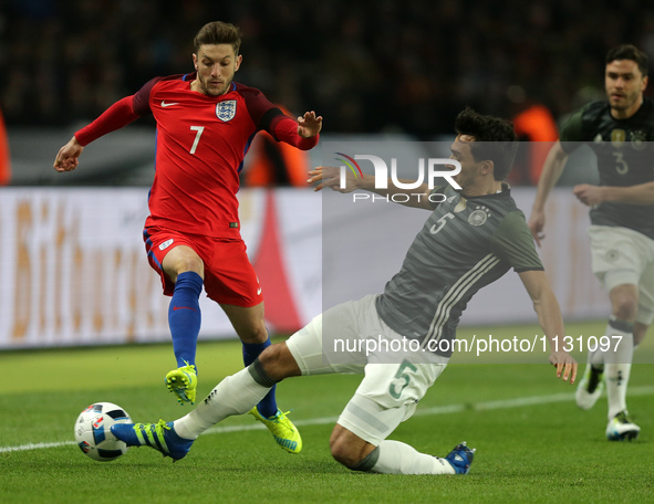 Adam Lallana (England),Mats Hummels (Germany)

 in action during the international friendly soccer match between Germany and England at th...