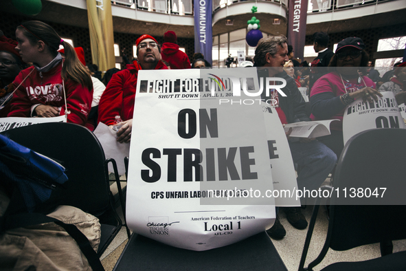 Strike poster left on a chair in the Student Union Building. 
Teachers gather to protest against education cuts at Chicago State University...