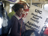 Protesters made their way into the Racine Blue Line station during a one-day strike on April 1, 2016 in Chicago, Illinois. Chicago teachers...