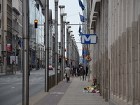 People walk around the Maelbeek metro station, which maybe open the doors again in Monday 25 of April, 2016.The daily life in Brussels a mon...