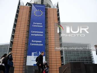 People walk in front of the European Commission in Brussels, Belgium.The daily life in Brussels a month after the terrorist attacks which to...