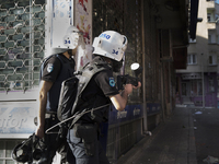 Police shot rubber bullets at protesters in the Alevi enclave of Okmeydani in Istanbul on May 22, 2014 after Ugur Kurt was shot and killed w...