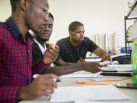 Physicists do their home task before a lesson at physics laboratory in the University of Namibia, Windhoek, Namibia ( (